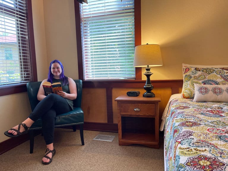 woman reading in bedroom